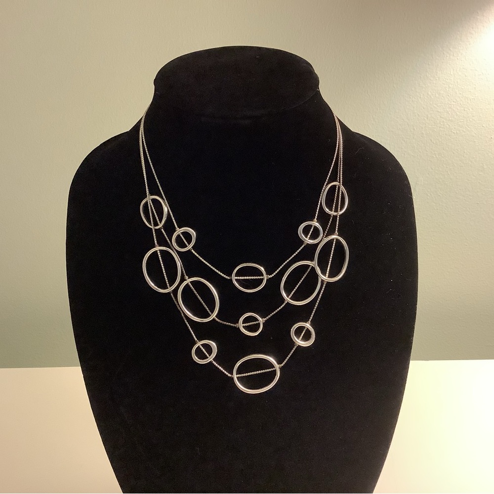 Adjustable, multi shaped rings necklace